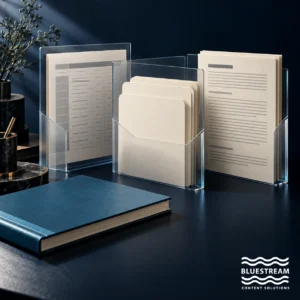 Three overlapping transparent sleeves hold structured records and documentation.